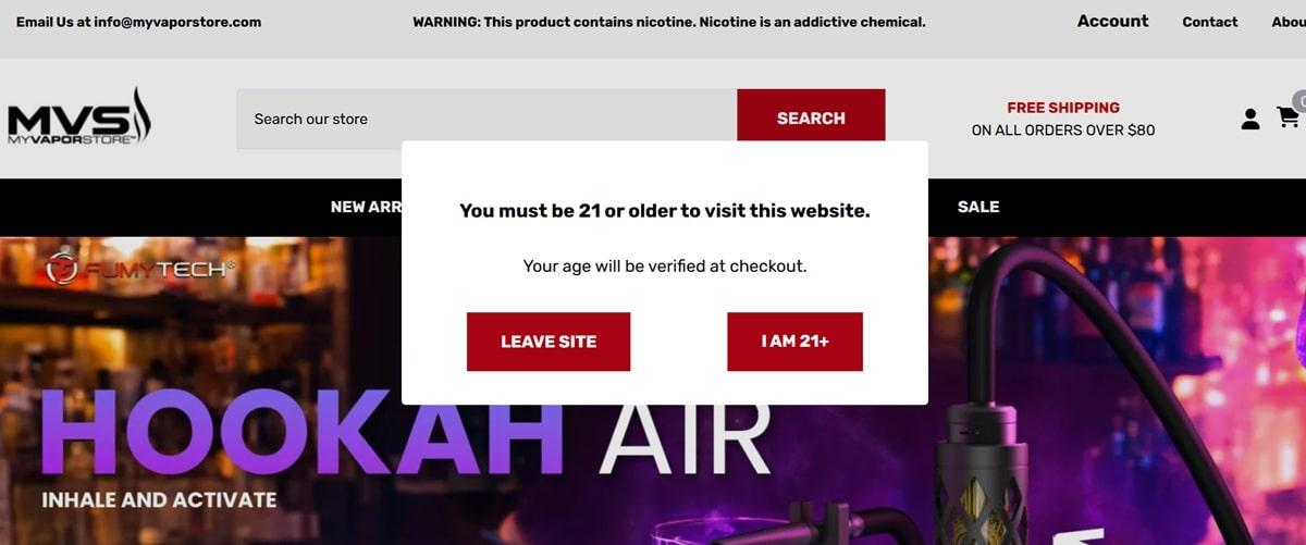 Legal compliance splash page requiring age verification before accessing restricted content